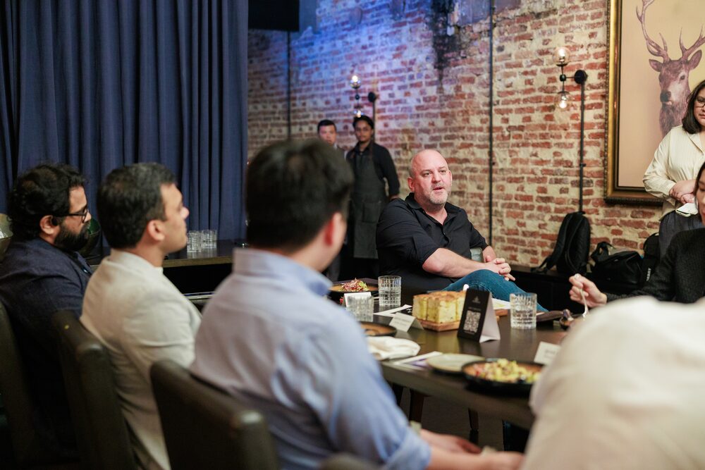 Adrian Watkins moderating an Ortus Club CXO roundtable, Singapore